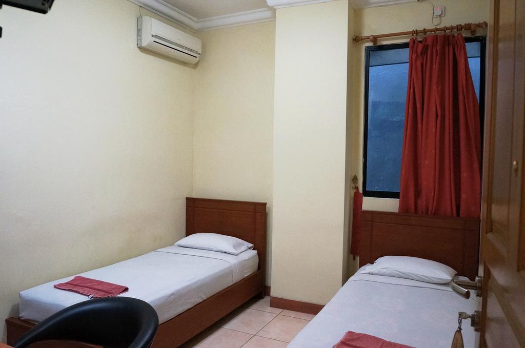 Jesnic Hotel Паданг Стая снимка